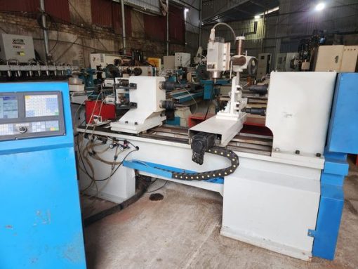 máy tiện cnc 2 đầu khắc hoa văn